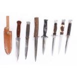 Six various knives with double edged blades, together with a Solingen double edged blade in sheath