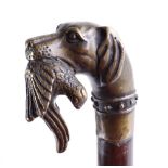 Walking cane with brass game dog and bird handle