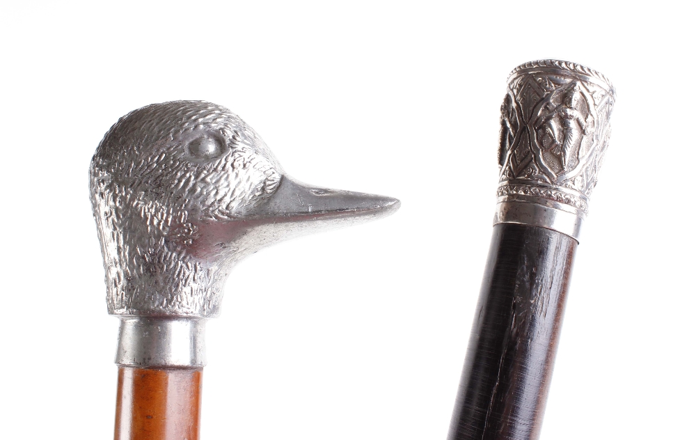 Walking cane with pewter figured duck pommel, and one other cane with decorative white metal pommel - Image 2 of 4