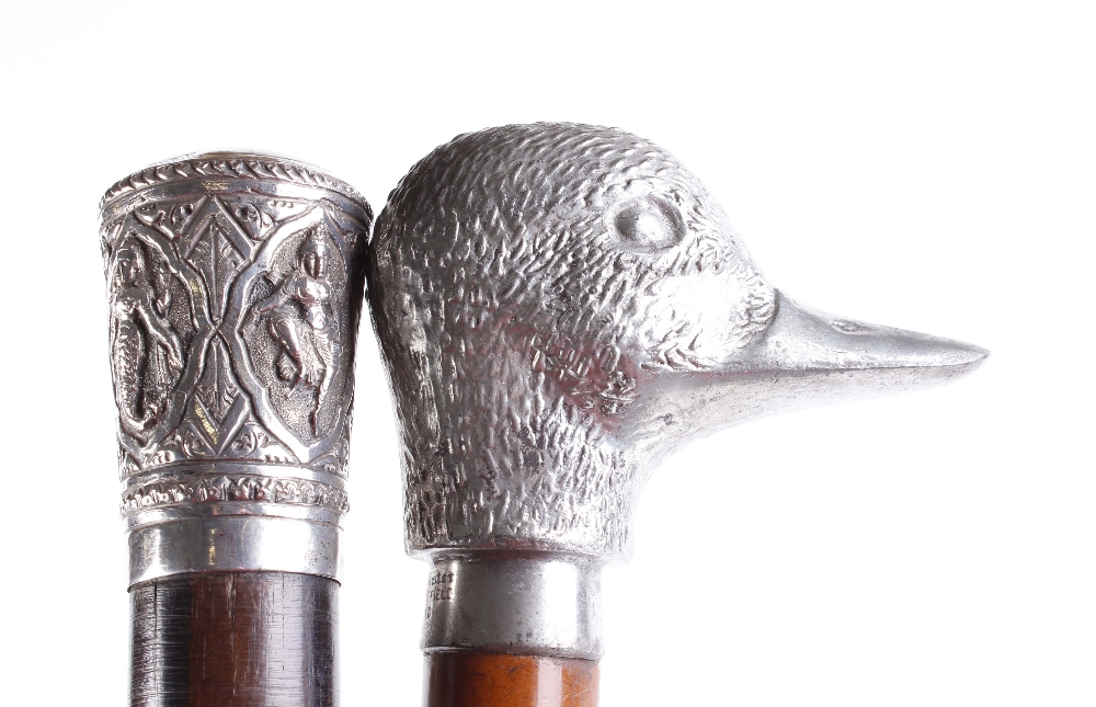 Walking cane with pewter figured duck pommel, and one other cane with decorative white metal pommel - Image 3 of 4