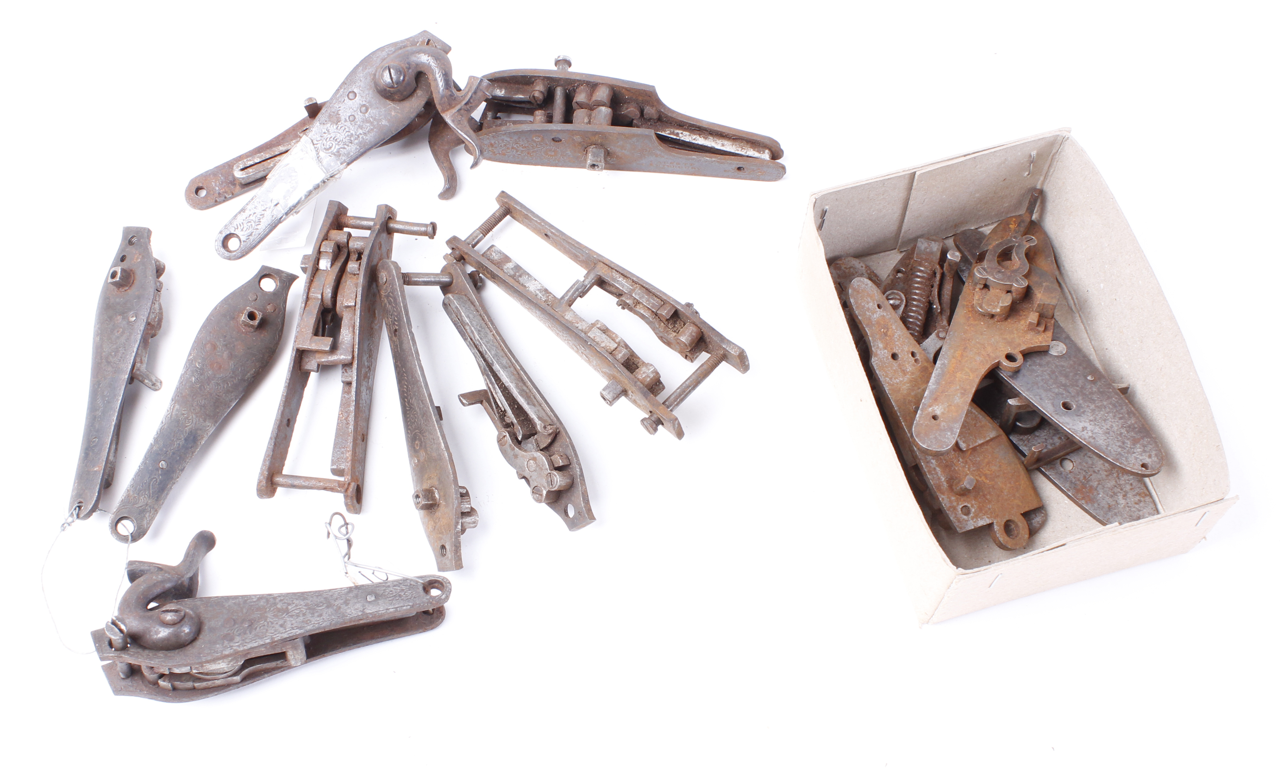 Seven pairs hammer gun locks; six sidelock plates, some with mechanisms