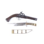 Ceremonial dagger, 8¼ ins blade, banded grips, brass pommel, in brass skeleton sheath with replica f