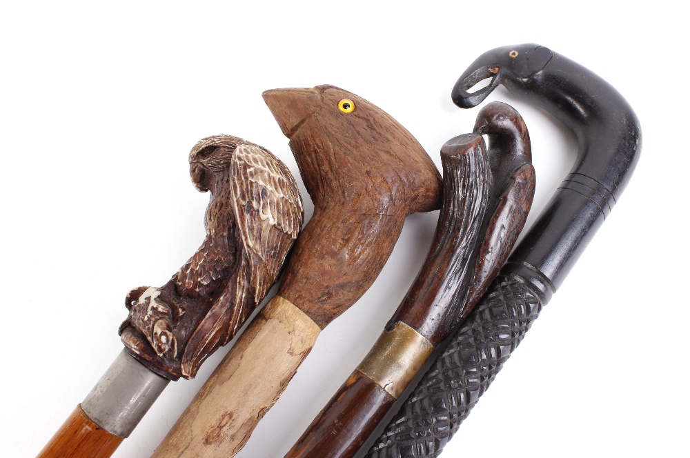 Four wooden walking sticks with decorative animal figured handles - Image 2 of 3