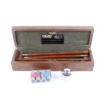 Boxed William Powell 12 bore cleaning kit, pair Lancaster 12 bore snap caps, pair Churchill 12 bore