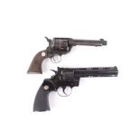 .22 blank firing revolver together with a replica 44-40 MGC revolver. This Lot is offered for the pu