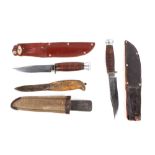 Two William Rogers 'I Cut My Way' knives, 5 ins blades, in sheaths; with one other wooden handled kn