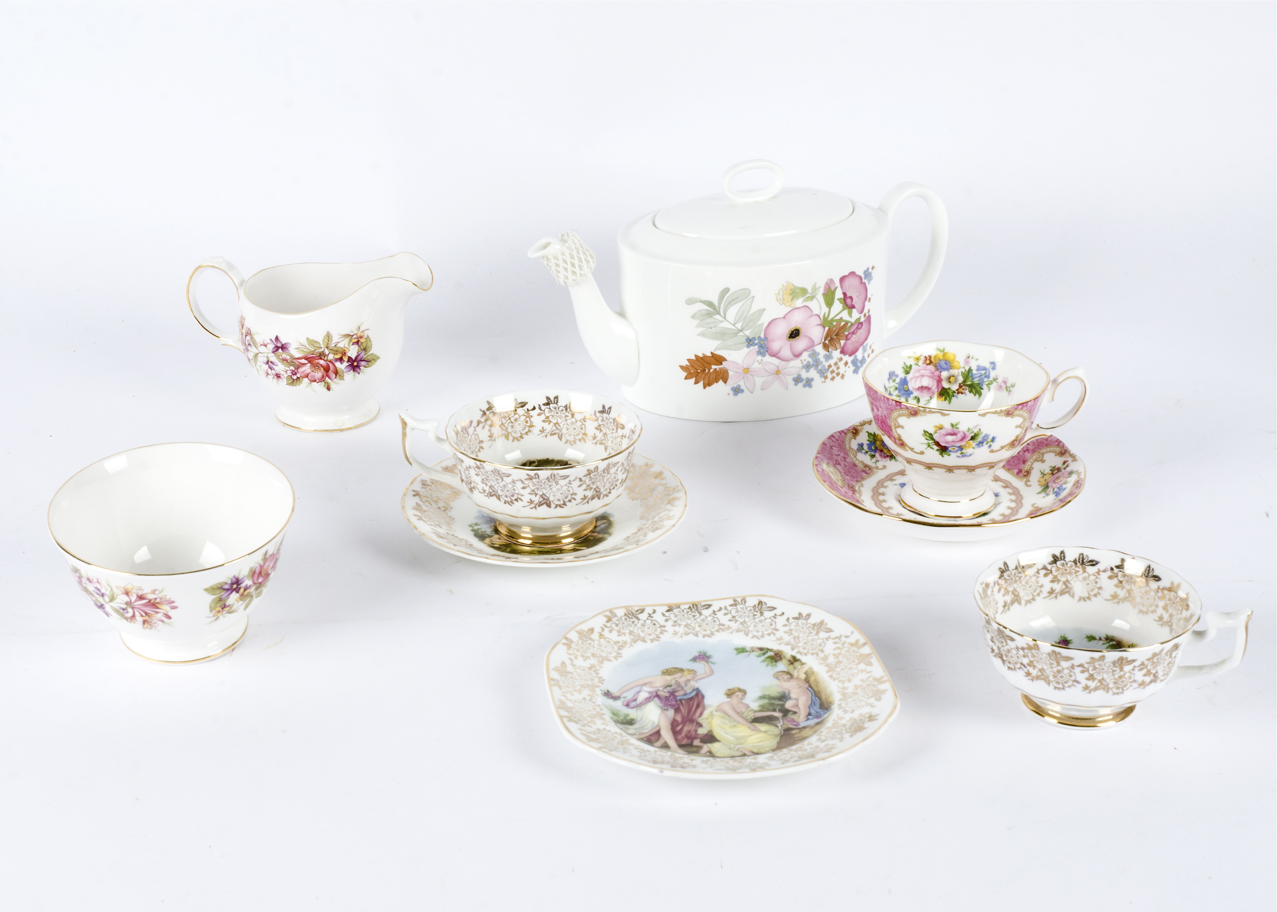 A Royal Albert six place tea service, in the 'Lady Carlyle' pattern, consisting of plates, cups
