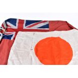 A British Naval Ensign flag, approx 178cm x 84cm, together with a small example and a silk