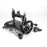 A lockstitch sewing machine, Atlas 'A' (one foot cracked)