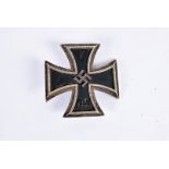 A WWII Iron Cross 1st Class, having pin back, marked L/50 just underneath the clasp please form