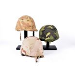 Three American helmets, to include PASGT helmet marked L-8 to inner, plus an M1 with liner, and