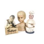 1950s Advertising Figures, three rubberoid examples, comprising Cutie by Marten Hats bust of a young