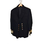 A male and females merchant naval dress jacket and hats, the male jacket having Captain insignia