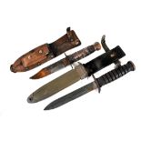 A US M3 Fighting/Combat knife, with US M8A1 WD scabbard, together with a US Airforce Survival knife,