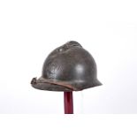 A WWI French Engineer's helmet, First Empire Style, having RF and armour motif to front, small