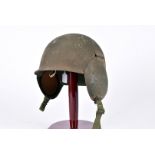 An American M3 Flak helmet for Aircrew, having fold down steel ear protectors, strap liner and
