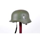 A Reproduction German Army Double Decal helmet, in green, with army decals to either side,