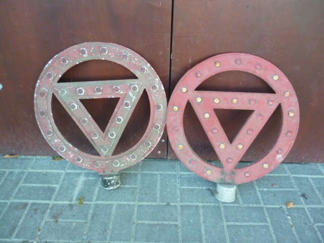 Original Pre Warboys Road Sign, two circular post top alloy red warning signs each with brackets and