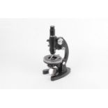 Various instruments, Cooke Troughton and Simms black-enamelled and chrome polarizing microscope,