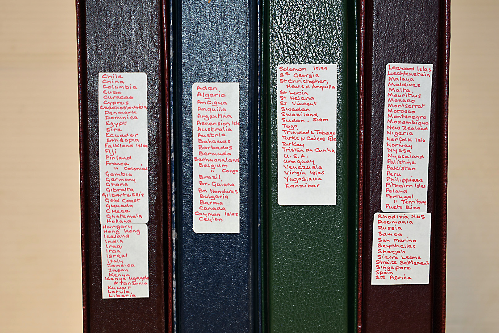 A collection of World stamps, in four albums with sleeves, annotated on the spines (4)