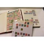 A diverse collection of world stamps, in two boxes, two albums from the USA, along with much more,