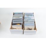 Postcards, a very large stock collection, various periods, in plastic sleeves, in long white