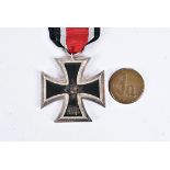 A WWII Iron Cross 2nd Class, marked in two places to the hanger loop '76' and the other