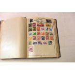 A world stamp album, an advanced school boy effort, some early 20th century
