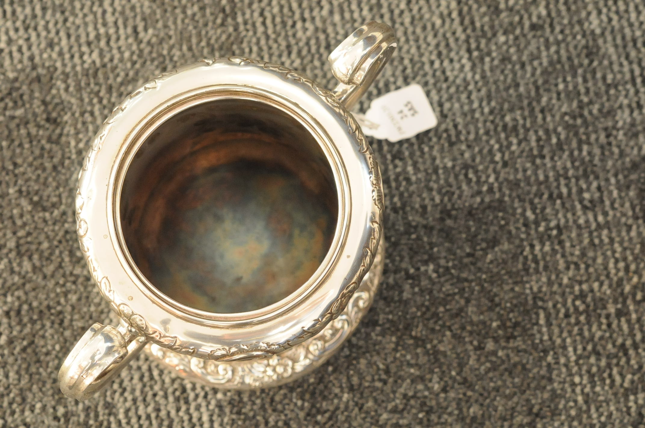 An Edwardian silver biscuit barrel by CW, twin handled with raised floral and rococo motifs, - Image 7 of 7