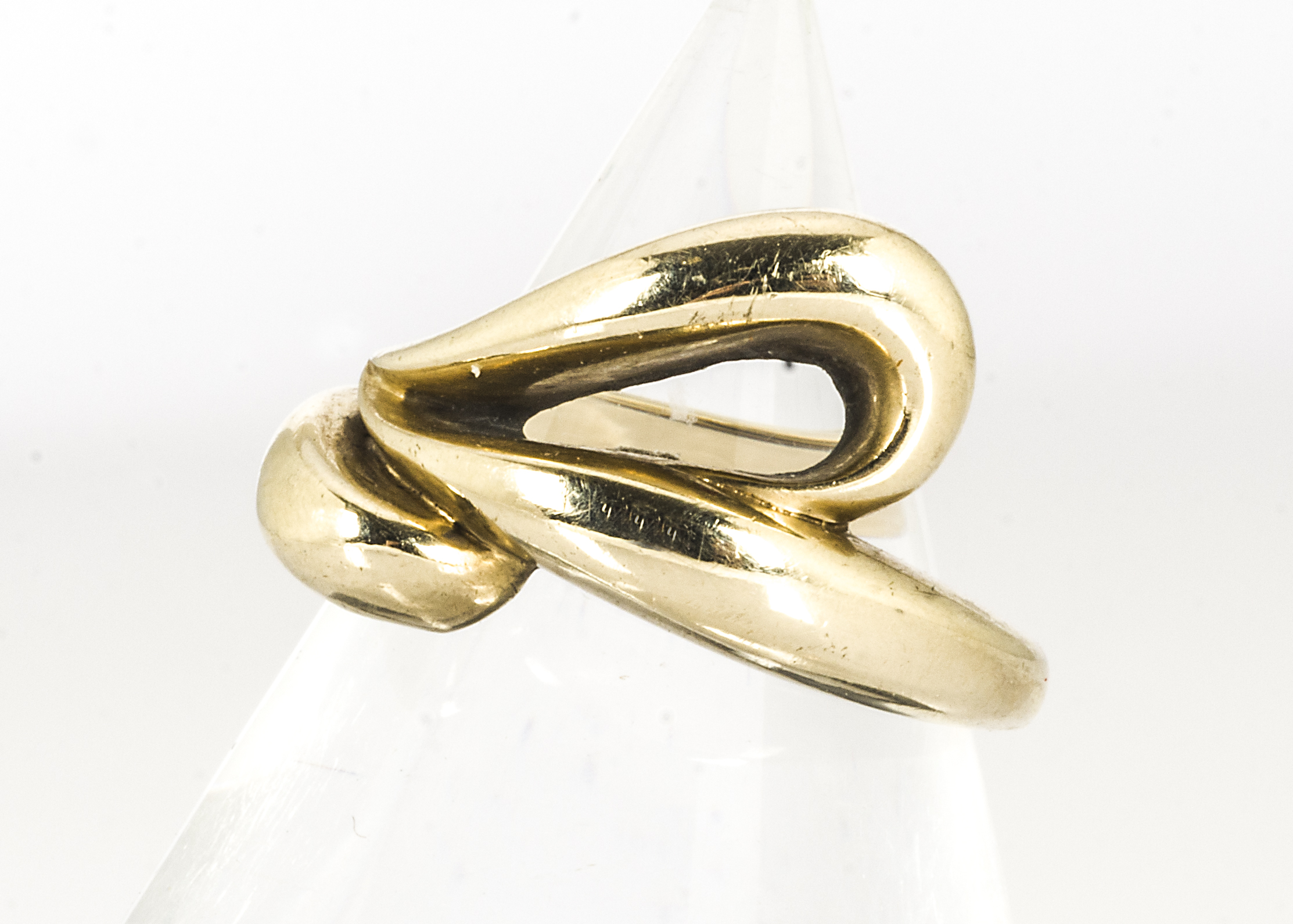 A continental 14ct gold dress ring, of lobed and whiplash form, marked to inner shank 585, ring size