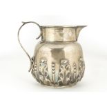A Victorian silver large jug by William Gibson & John Langman, retailed through Mappin Brothers,