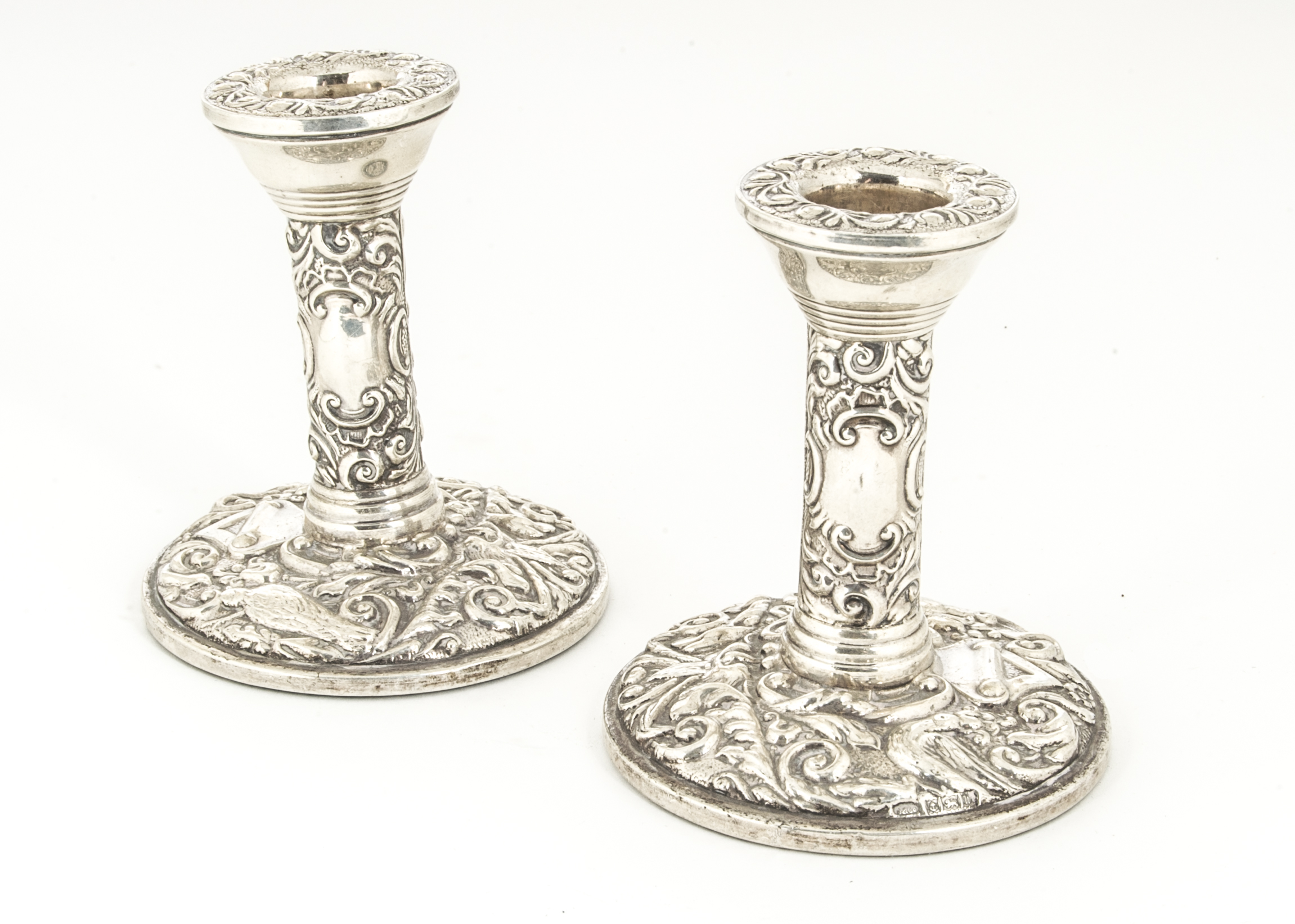 A pair of modern silver filled dwarf candlesticks