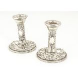 A pair of modern silver filled dwarf candlesticks