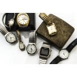 A collection of vintage and modern wristwatches, including a Seiko digital and two other digital