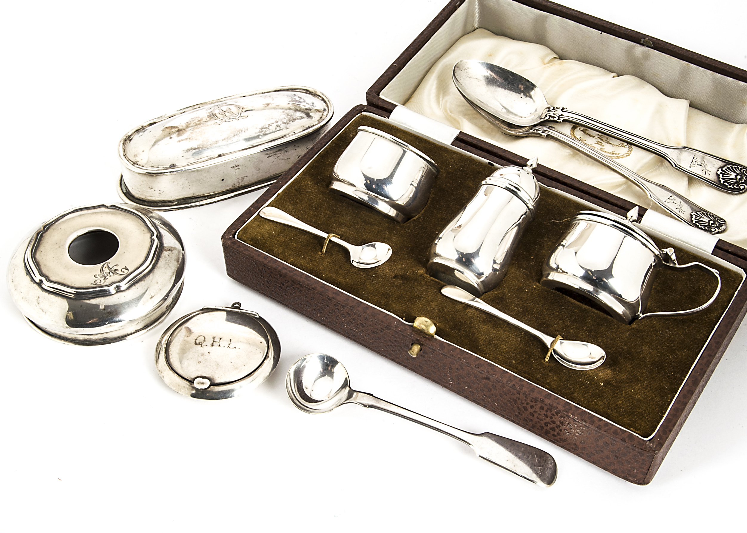 A cased c1960s silver three piece cruet set, together with a silver tobacco box, a silver compact, a