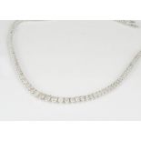 A contemporary diamond fringe necklace, the white 18ct gold graduated diamond set necklace with