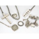 A quantity of silver jewels, including a charm bracelet, with Christmas cracker, old fashioned