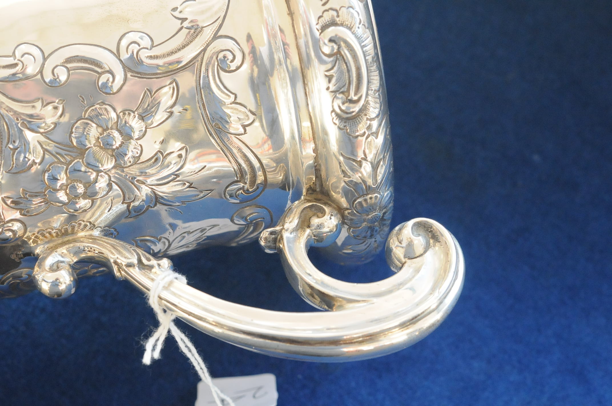 An Edwardian silver biscuit barrel by CW, twin handled with raised floral and rococo motifs, - Image 6 of 7