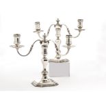 A nice pair of 1970s silver candelabra by BS, the Georgian taste cast octagonal bases supporting a