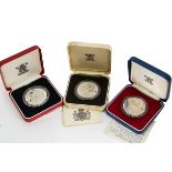 Eleven Royal Mint and other silver proof and silver crowns, all Royal Commemorative and boxed,