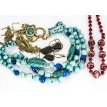 A simulated turquoise fringe necklace, together with a Venetian red glass necklace and a nephrite