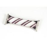 A contemporary ruby, mother of pearl, diamond, onyx and seed pearl set brooch, in 18ct white gold