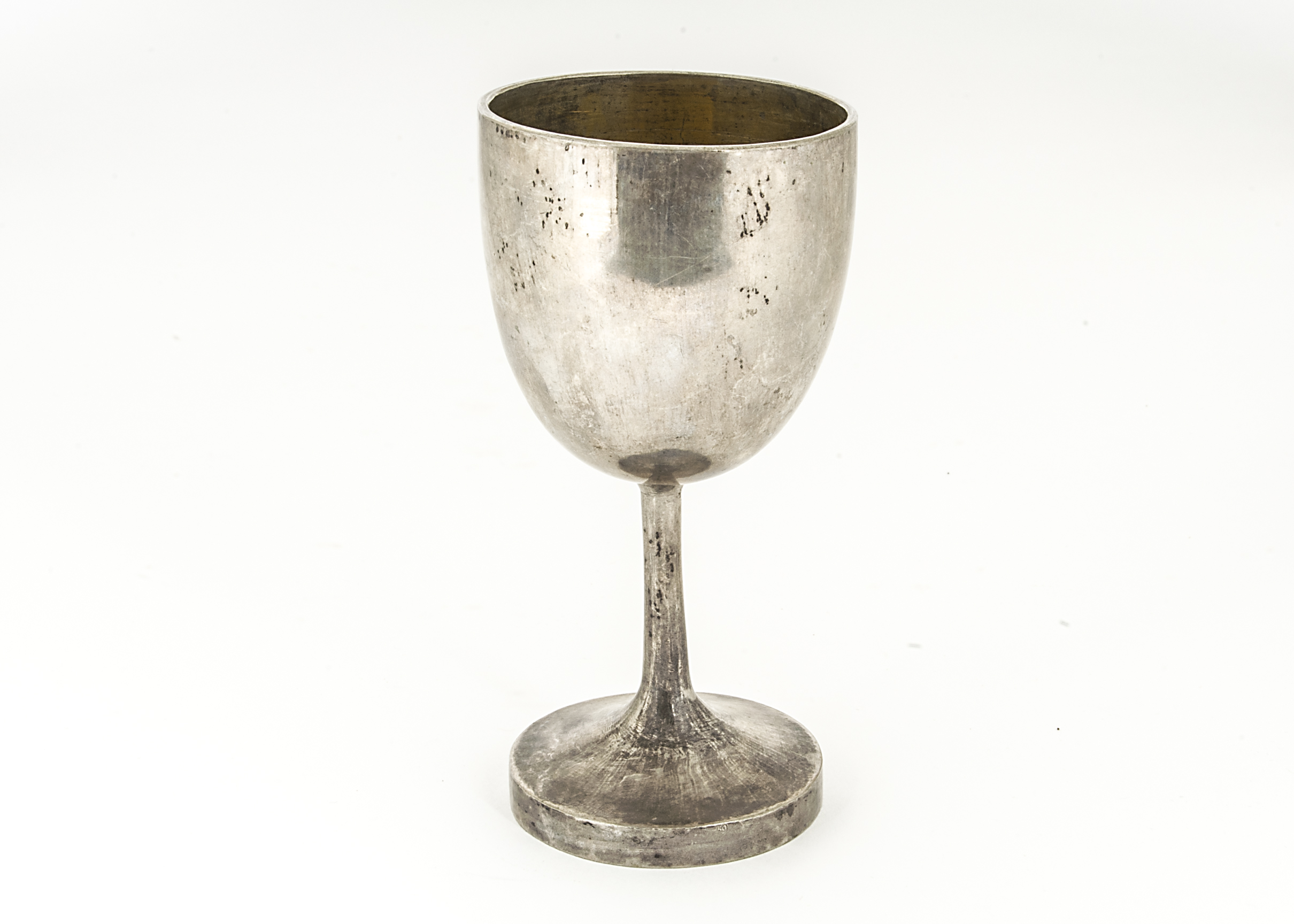 An early 20th Century Chinese white metal goblet, marked to base rim