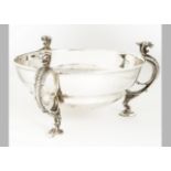 A good silver centrepiece bowl from Mappin & Webb, the 26cm diameter bowl on three scroll leaf and