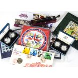 A collection of modern coins and numismatic First Day Covers, including eight £5 coins, two silver