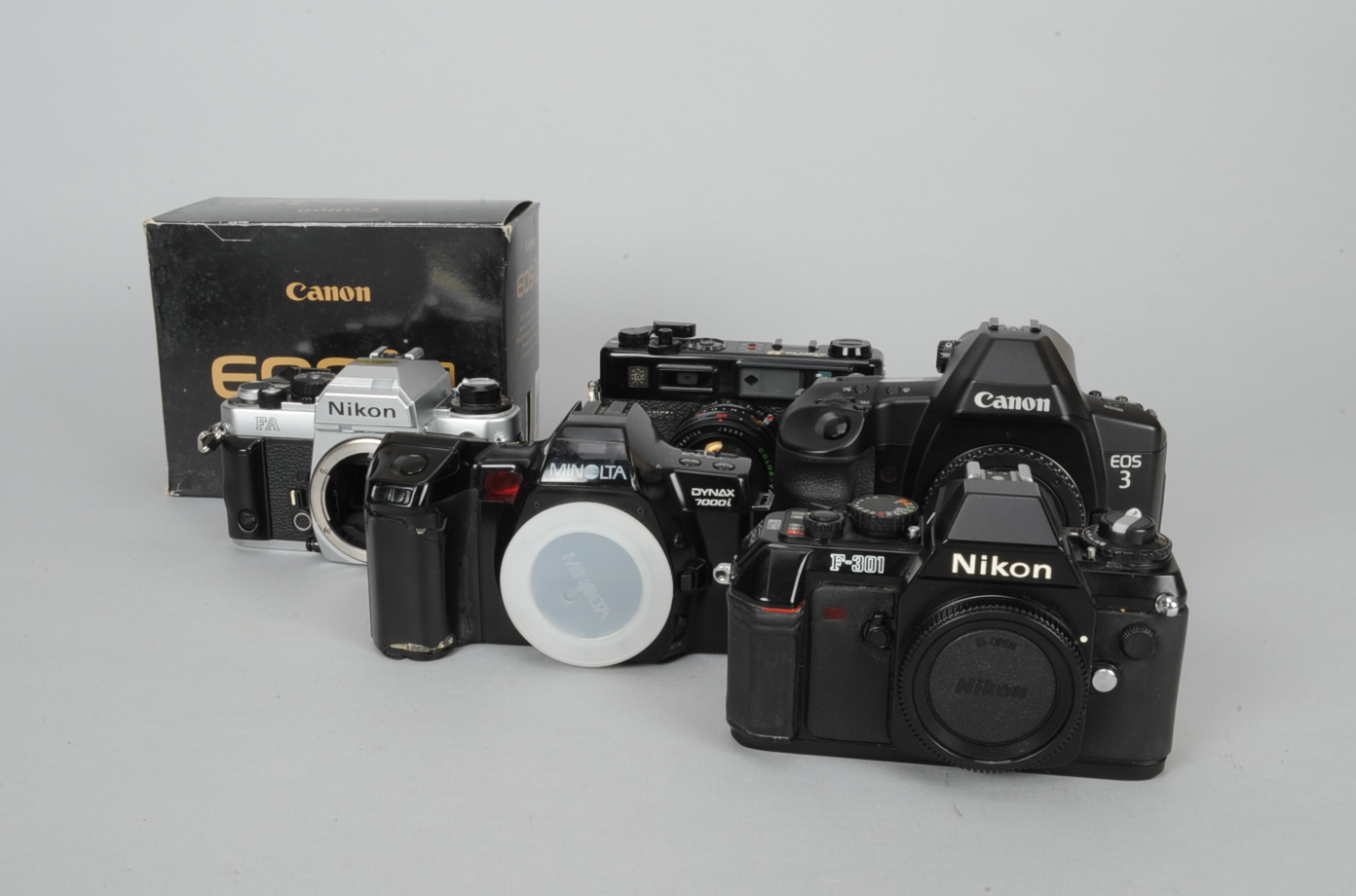 SLR Camera Bodies, a Canon EOS 1N with box, a Canon EOS 3, a Nikon F-301, a Nikon FA, a Minolta