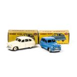 Dinky Toys 153 Standard Vanguard Saloon, two examples, first cream body and hubs, second mid-blue