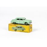 A Dinky Toys 172 Studebaker Land Cruiser, light green body, mid-green hubs, in original box, E,