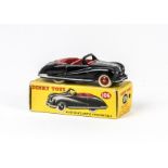 A Dinky Toys 106 Austin Atlantic Convertible, black body, red interior and ridged hubs, white tyres,