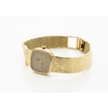 A c1980s Baume & Mercier 18ct gold lady's wristwatch, 20mm case on integrated strap, AF, with quartz